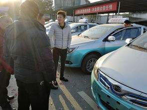 咸宁地区首批新能源出租汽车比亚迪E5交付使用